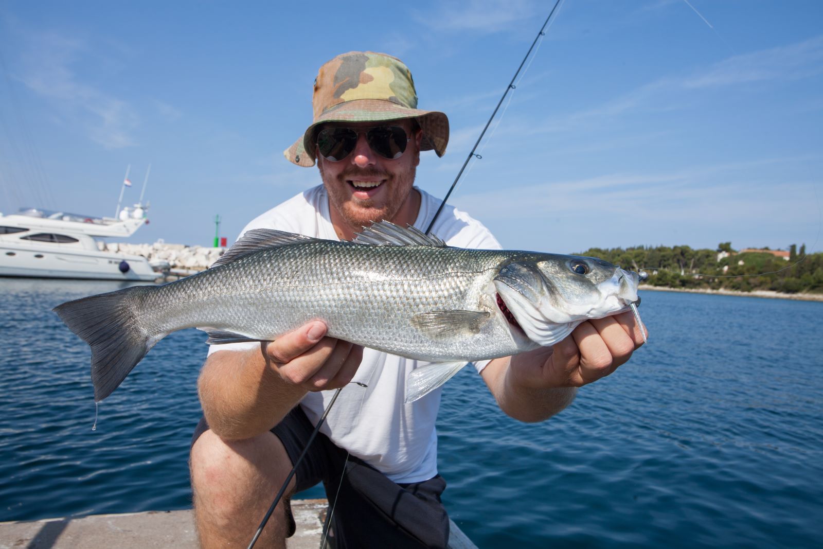 man holding fish